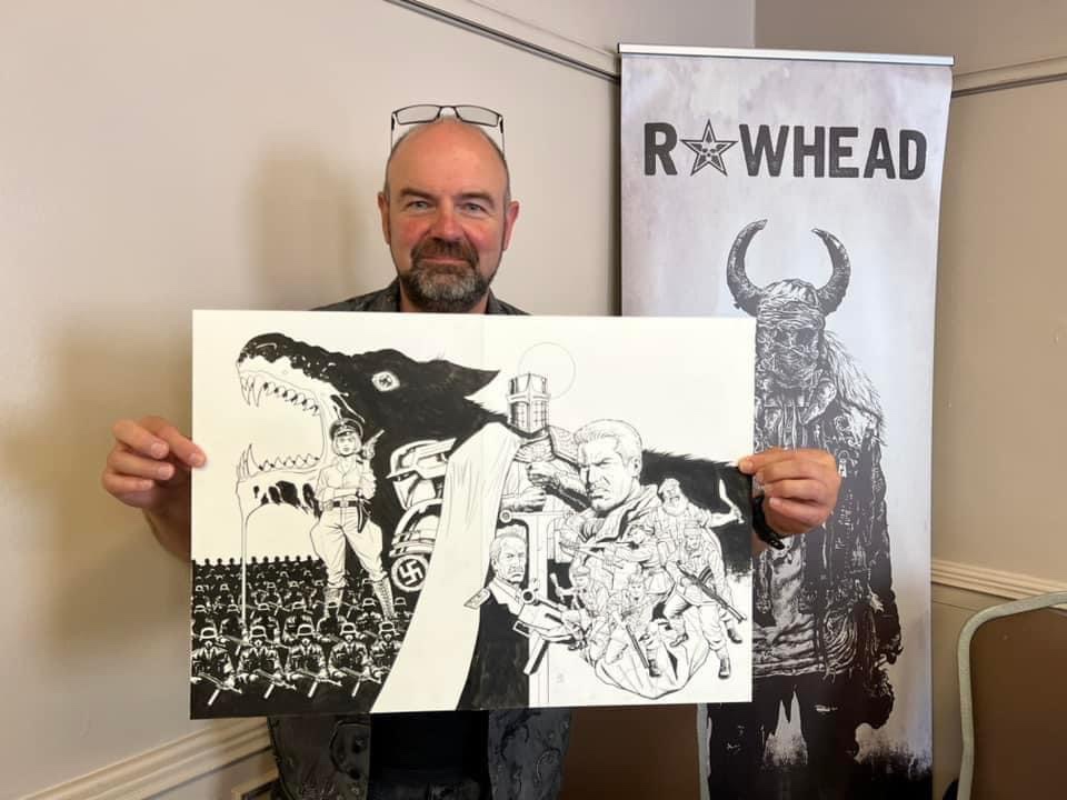 Noel (writer and co-creator of Unit 666) with the the stunning original Patrick Goddard variant cover artwork for the project, at this year’s Lawless Comic Con