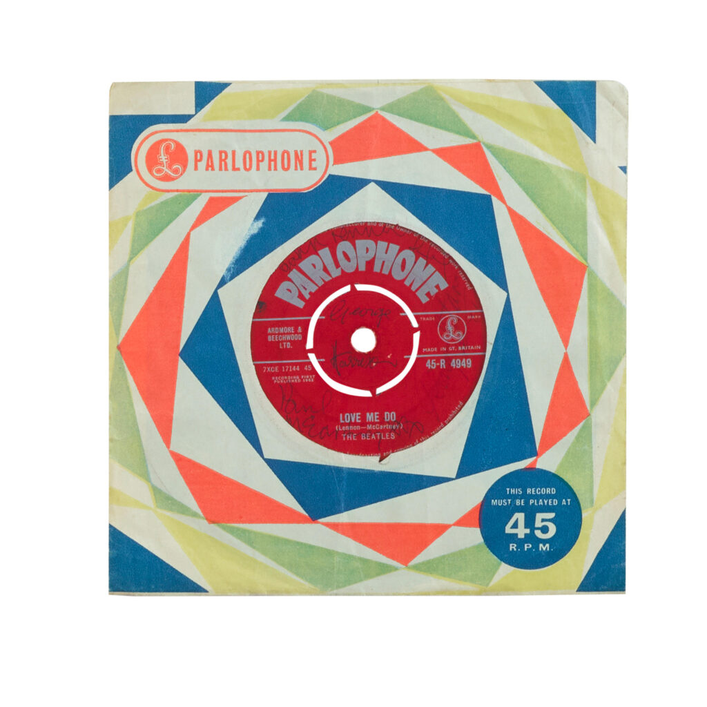 A single record, "Love Me Do," Parlophone Records, 1962, signed on the A-side label in blue ballpoint pen by John Lennon, Paul McCartney, George Harrison and Ringo Starr. Sold by Bonhams at auction in 2021 for $20,312.50