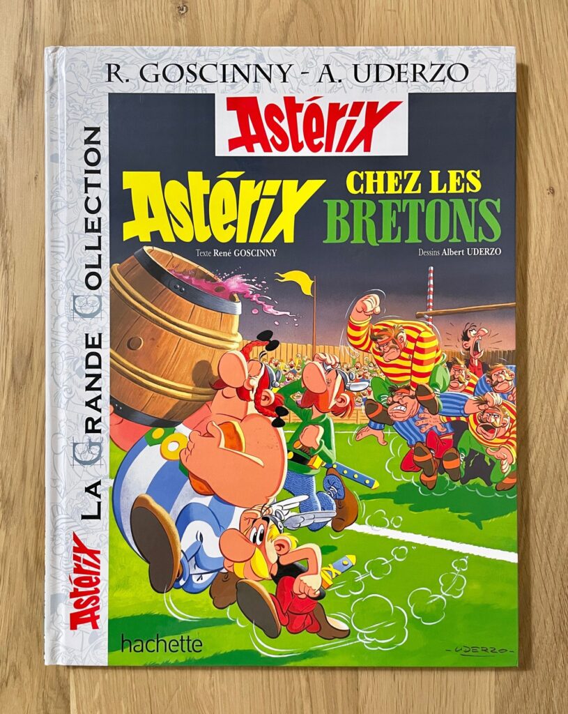 A dedicated copy of a French edition of Astérix chez les Bretons (Asterix in Britain) with a pencil drawing inside by co-creator Albert Uderzo