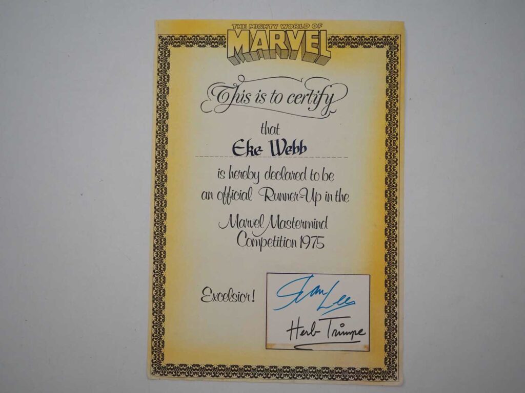 1975 Marvel Mastermind Certificate. An annual Marvel Mastermind competition was run in the pages of the Mighty World of Marvel comic in the mid 1970s. This is an unused 1975 runner-up certificate signed by Stan Lee and artist Herb Trimpe
