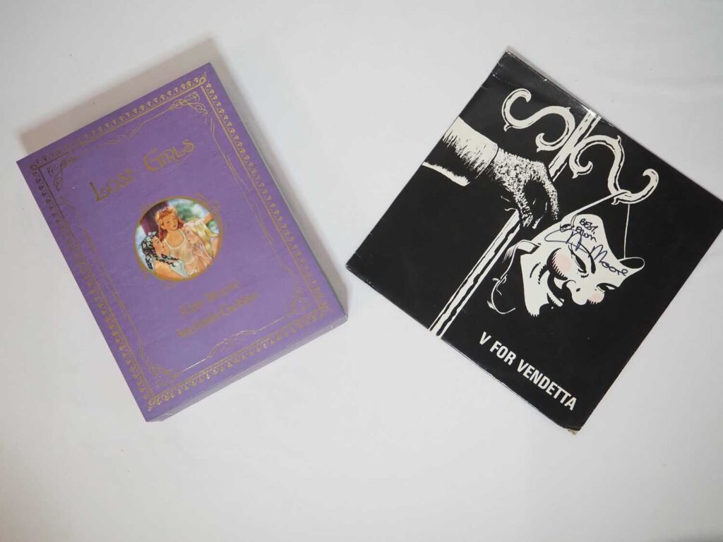 Alan Moore Lot (2 In Lot). Includes V For Vendetta 12" Single (Glass Records 12032) signed by Alan Moore (1984) + The Lost Girls (2006) 3 Volume Hardcover in Slipcase signed by Alan Moore and Melinda Gebbie