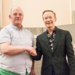 Edward Taylor with one of the Manga Jiman competition judges, Paul Gravett