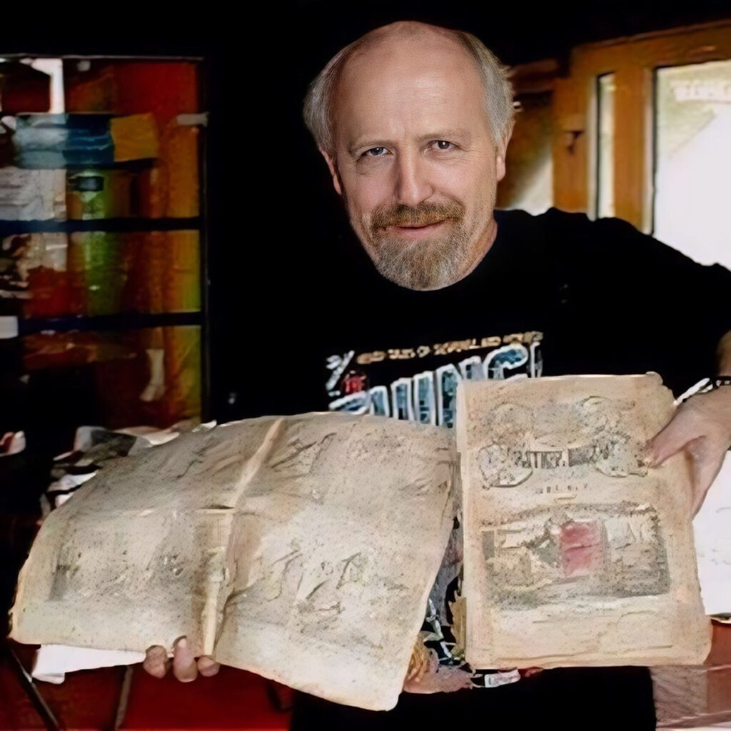 Bob Beerbohm in 2017, holding two copies of America's very first real comic strip (magazine) book dating back to 14th September 1842 published by WIlson & Co, NYC as Brother Jonathan Extra #9, The Adventures of Obadiah Oldbuck, originally drawn by Rodolphe Topffer in 1828 in Geneva, Switzerland which is where the "modern" comic book was printed as lithography was created, thus invented there. “Staples were not yet invented back then hence Obadiah was bound with thread like string,” Bob noted. “Pulp paper made from wood was not invented until the 1880s.”