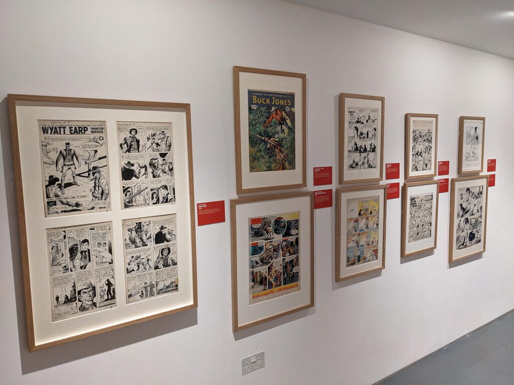 Artwork including "Wyatt Earp" and "Buck Jones", part of the Cartoon Museum's "Heroes" exhibition (2024)