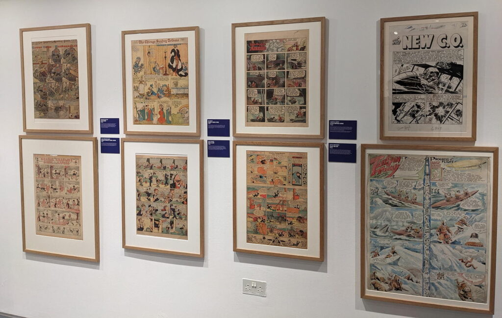 Various artworks forming part of the Cartoon Museum's "Heroes" exhibition (2024)