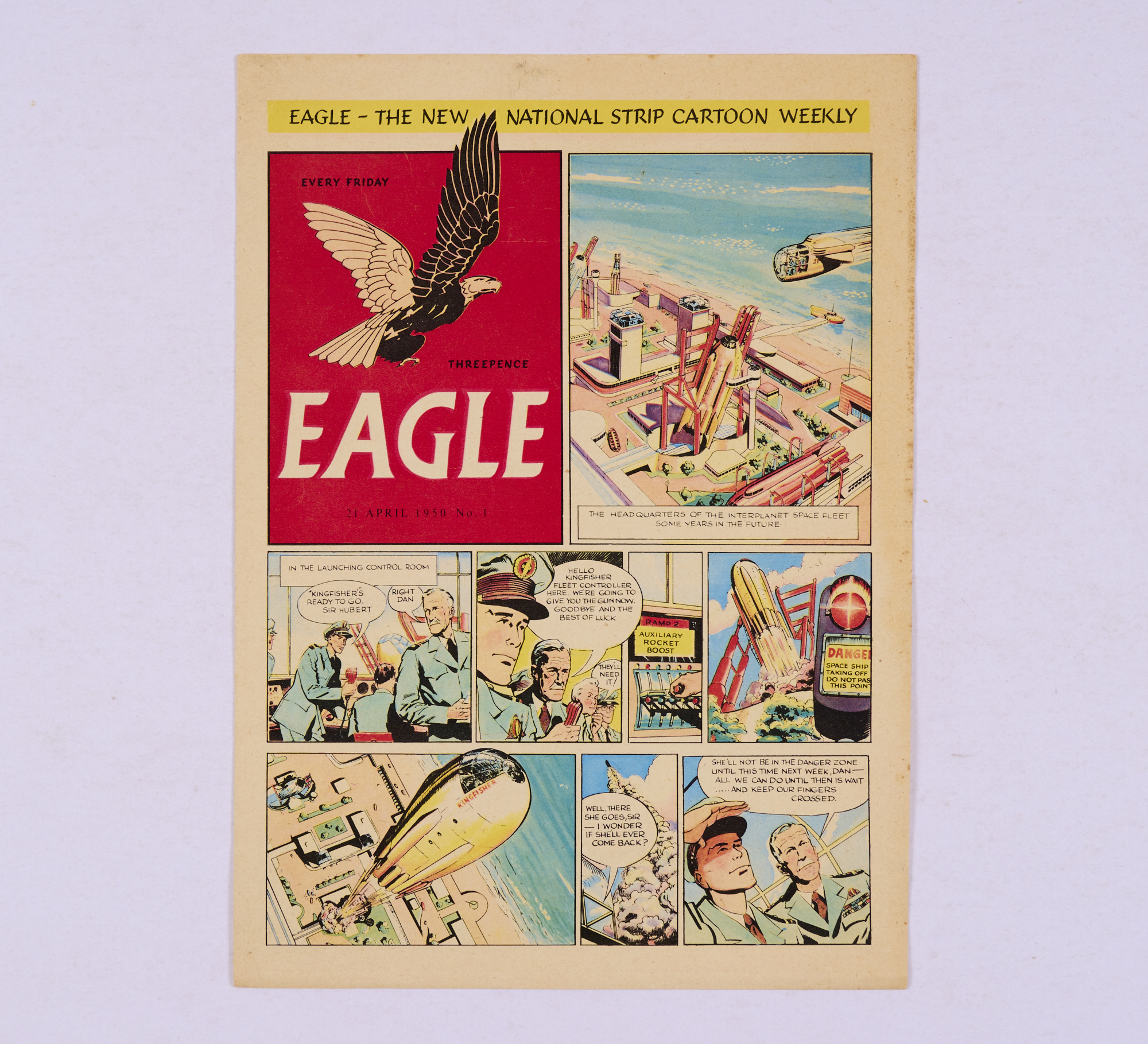 Eagle No 1 promotional eight-page full colour issue distributed to churches and schools in the UK in 1950 to publicise the imminent print run of the first issue of The Eagle. The front cover has no 'Dan Dare Pilot of the Future' header and a different date of 21st April 1950. Bright fresh colours. The back corner has two small lower corner edge pieces missing and some discoloured tape marks. Only a handful of copies are known to exist