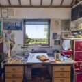 Raymond Briggs's desk and the view from his studio across the Weald to the North Downs near Caterham Photo via Ditchling Museum