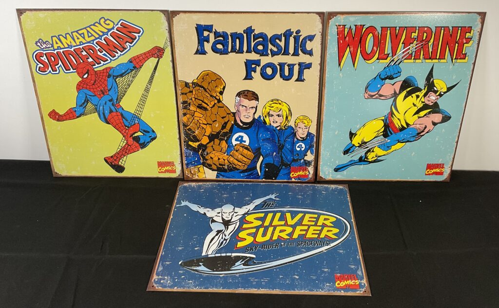 A group of tinplate Marvel character signs featuring Wolverine, Spider-Man, Fantastic Four and Silver Surfer in vintage style, 32cm x 41cm