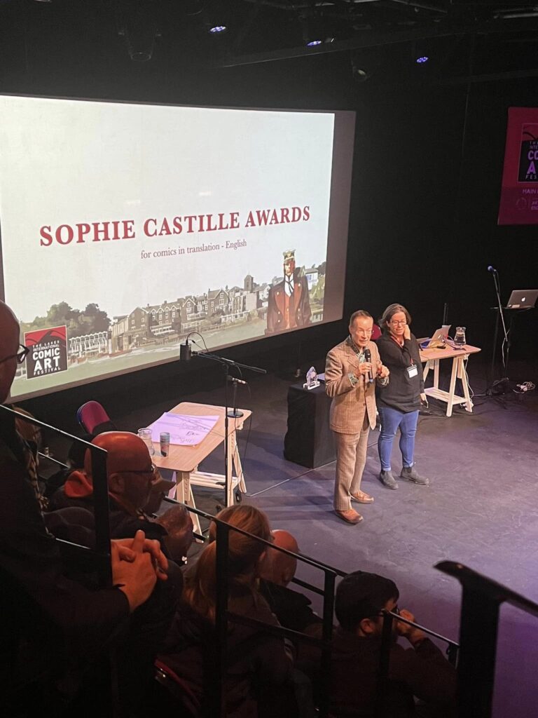 Paul Gravett and Carol Adlam announce Alexa Frank as the winner of this year’s Sophie Castille Awards for Comics in Translation – English. Photo: Carole Tait
