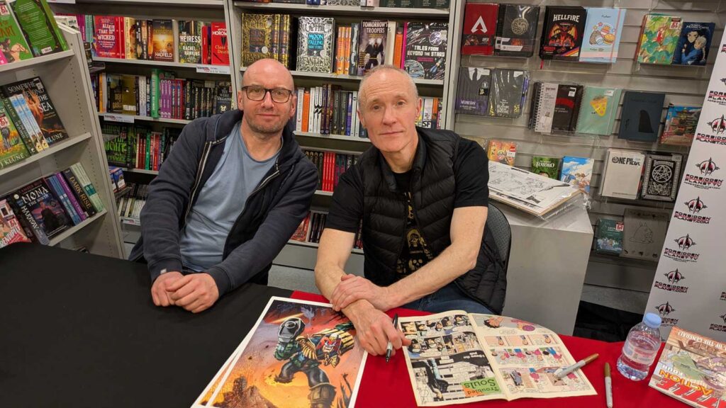 Forbidden Planet Battle Action Signing Event - Saturday 14th December 2024 at Forbidden Planet London Megastore. Rob Williams and John McCrea. Photo: James Bacon