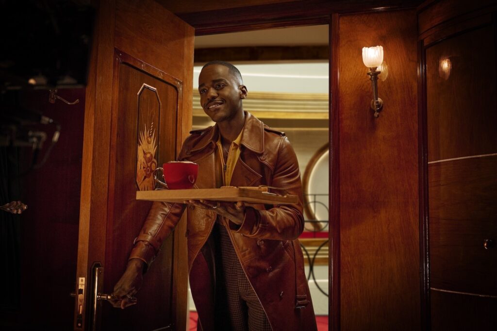 Doctor Who – Joy to the World Christmas Special | The Doctor (Ncuti Gatwa), hopping between time zones via the Time Hotel | Image: BBC