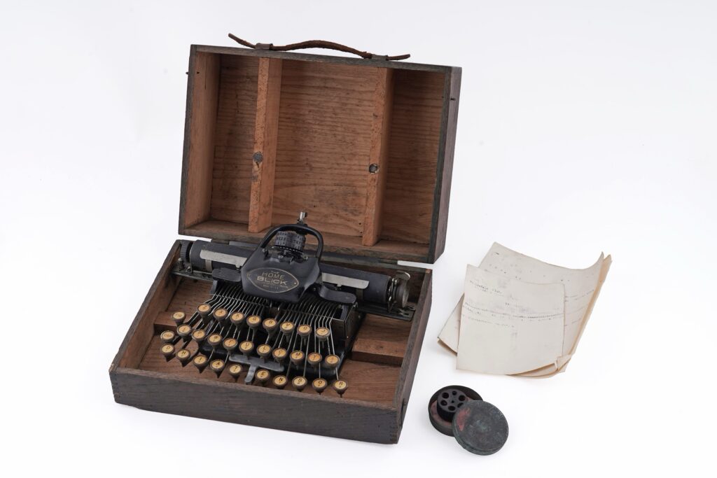 An early 20th Century ‘The Home Blick’ typewriter, in pine travel case