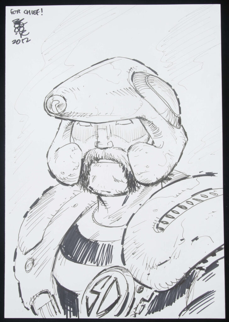 Boo Cook an original artwork of Johnny Alpha from 2000 AD (2012).
Illustrated work, graphite and inks to paper.

Signed by artist to lower margin. Dedicated by artist.

Generally excellent condition.

Original art size approximately: 29.5cm x 20.5cm.