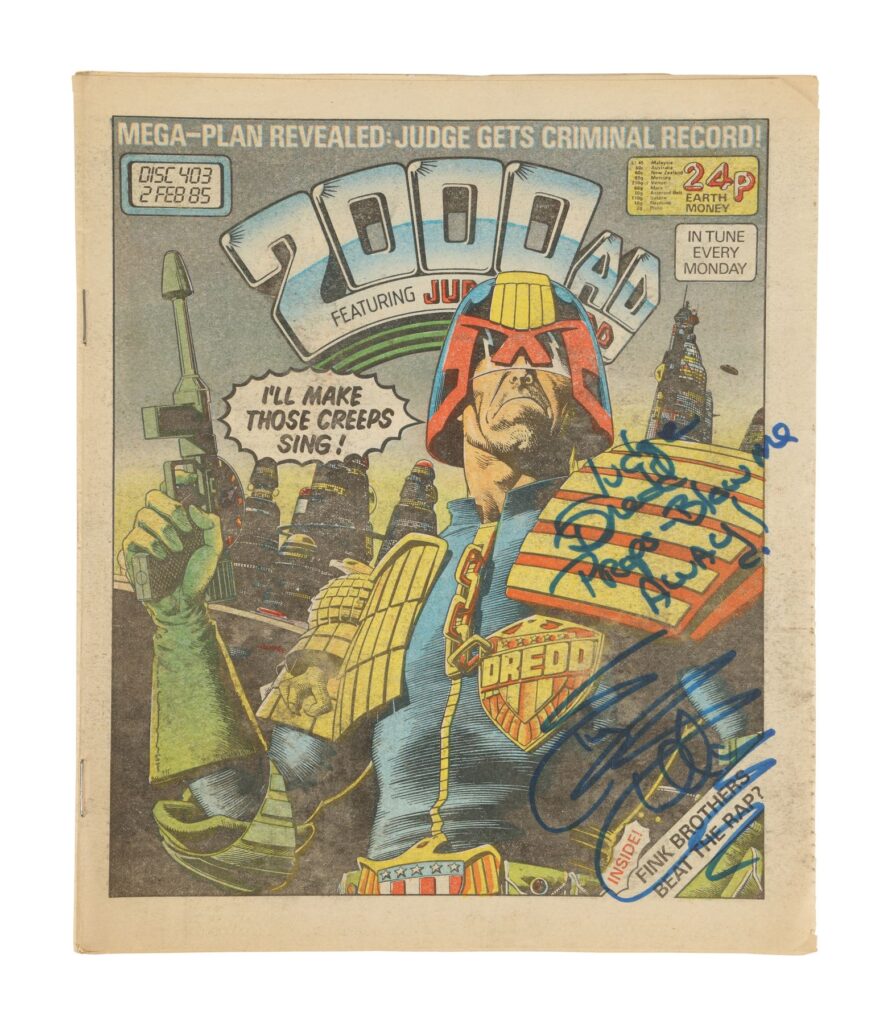 One of a set of four 2000AD comics autographed by Sylvester Stallone on the production of Danny Cannon's sci-fi action film Judge Dredd