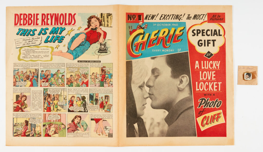Cherie No 1 (1960 D.C. Thomson) wfg Lucky Love Locket with a photo of Cliff. Starring Three Girls in A Flat, Marty Wilde Q&A with photo centrespread, Dandy Brad the Charming Cad and 'Ask Sis - She Knows All the Answers': eg Q -'What is a French Roll? asks Janis of Solihull. A - ' It's a hairstyle, Janis, the hair is rolled up vertically at the back of the head'. (Comic Book editor: 'It's also a baguette or an enjoyable afternoon with a Frenchman') [vfn]