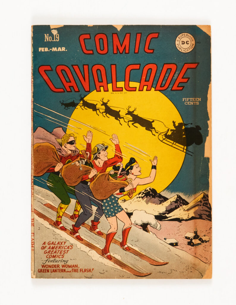 Comic Cavalcade 19 (1947) Christmas issue. Cover with some edge loss, tanned interior covers, cream pages with darker edges [vg]. No Reserve