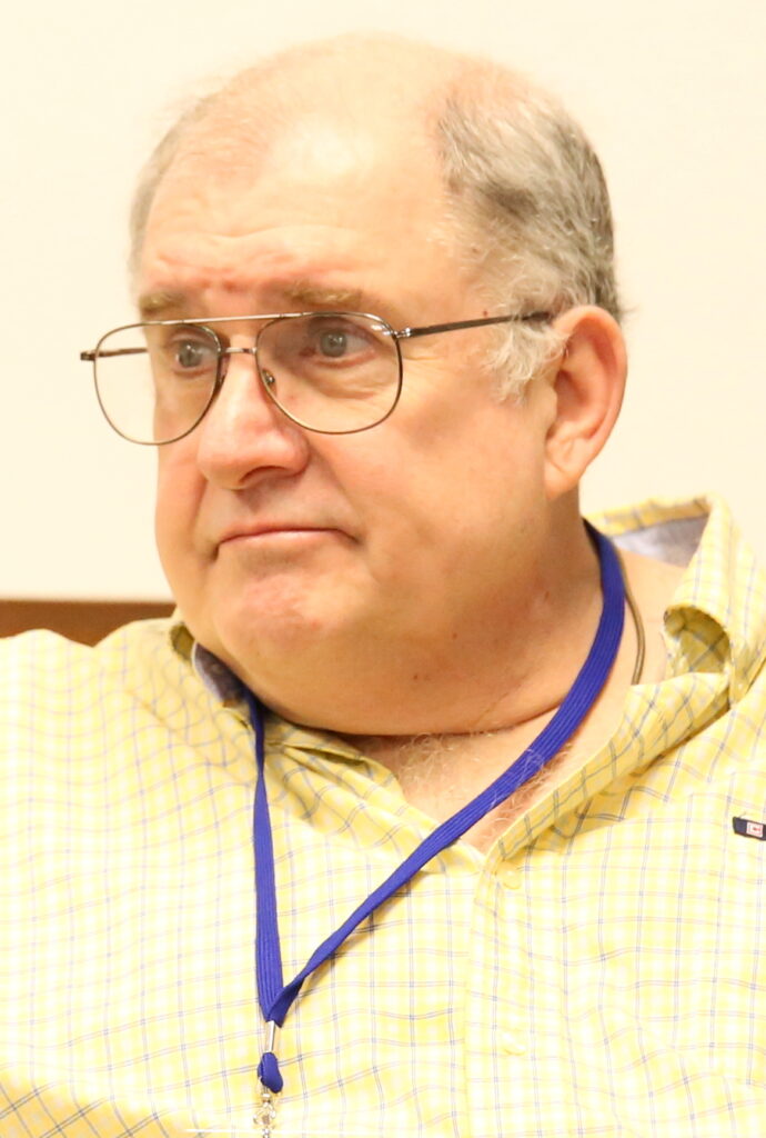 Mike W. Barr in 2015. Photo by Super Festivals - https://www.flickr.com/photos/superfestivals/16640397955/, CC BY 2.0, https://commons.wikimedia.org/w/index.php?curid=86252746