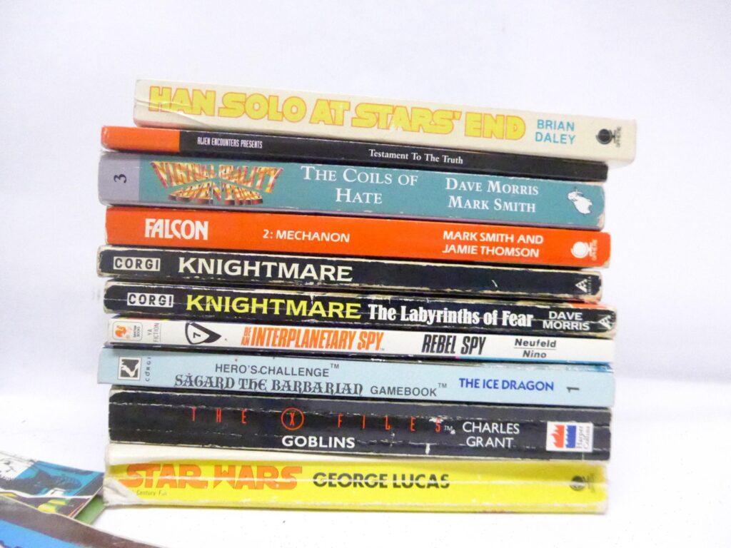 This collection of fantasy and sci-fi gamebooks and novels includes Knightmare, early Star Wars fiction, The X-Files, and more, along with a Warhammer Battle Bestiary, Doctor Who and Star Wars fanzines, 1990s 2000AD and Judge Dredd comics, and TV Zone magazines