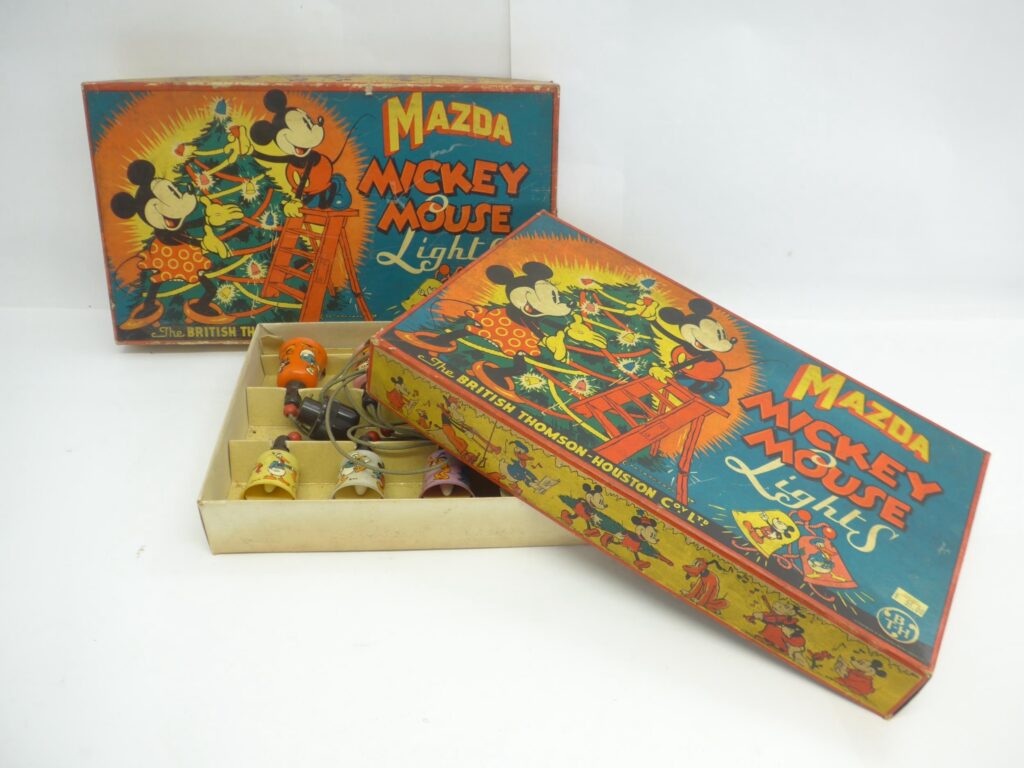 Two 1940s Walt Disney Mickey Mouse Mazda Christmas Lights sets by The British Thomson-Houston Co Ltd. Housed in pictorial lidded card boxes