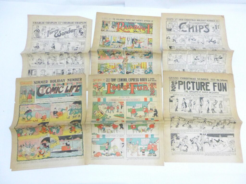 Early 20th Century comics including The Funny Wonder featuring Charlie Chaplin vol.II no.72 dated August 7 1915 (tear to cover), Comic Life no. 893 date July 31 1915, The Rainbow vol.4 no. 168 dated April 28 1917, Lot-o'-Fun vol.18 no.453 dated November 14 1914, Picture Fun vol.9 no. 307 dated December 26 1914, and Illustrated Chips no. 1477 dated December 21 1918 (6, folded)