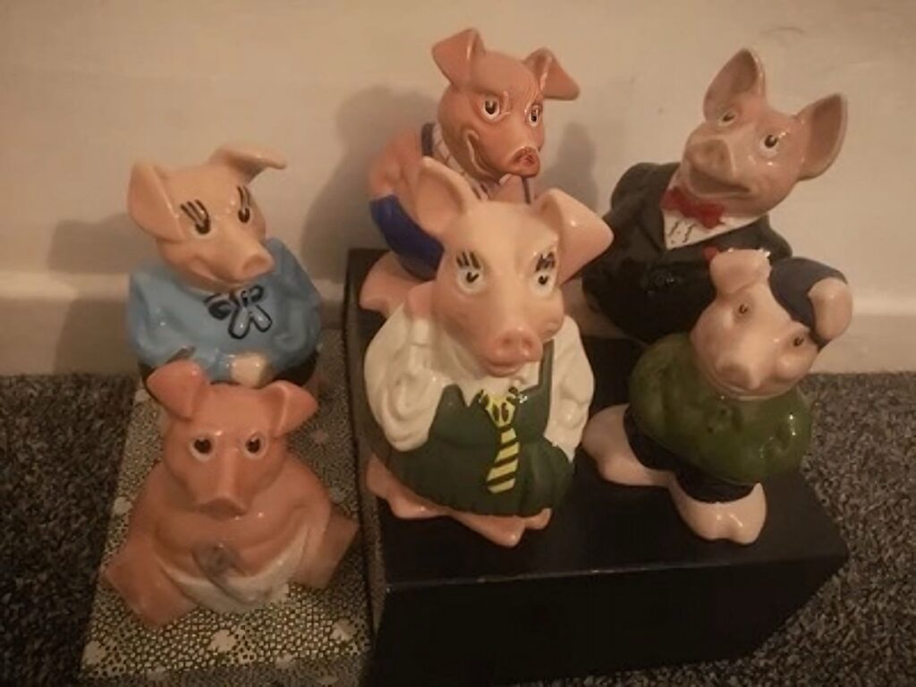 A full set of genuine Wade NatWest piggy banks including “Cousin Wesley” | Image via eBay