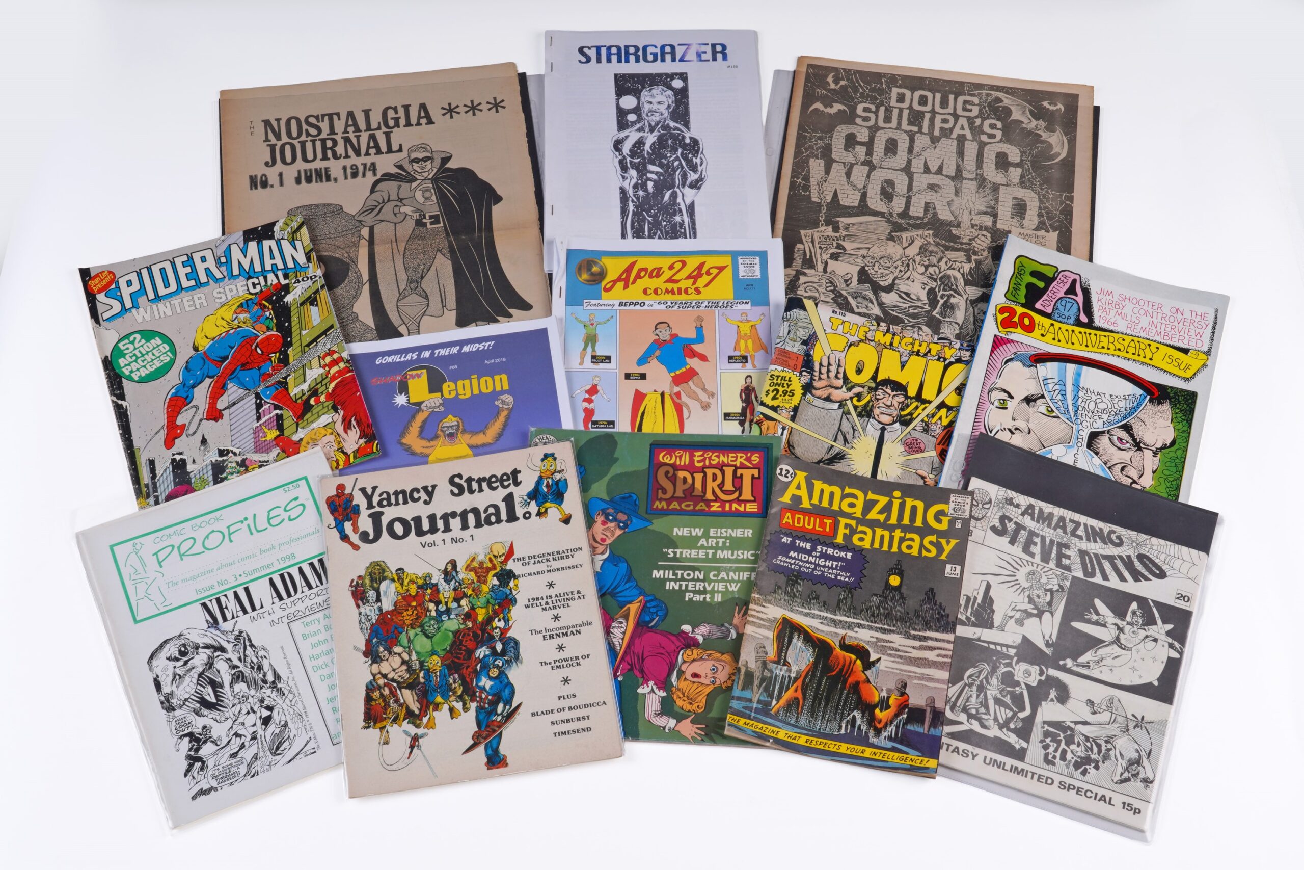 Fanzines, comics and related literature, comprising: Yancy Street Journal Vol. 1 No. 1; Comic Book Profiles No. 3 – Neal Adams; Fantasy Advertiser 20th Anniversary Issue, 1986; Fantasy Unlimited No. 21 – Steve Ditko Special, 1974; British Marvel Spider-Man Winter Special 1979; and other fanzines and comics-related publications.