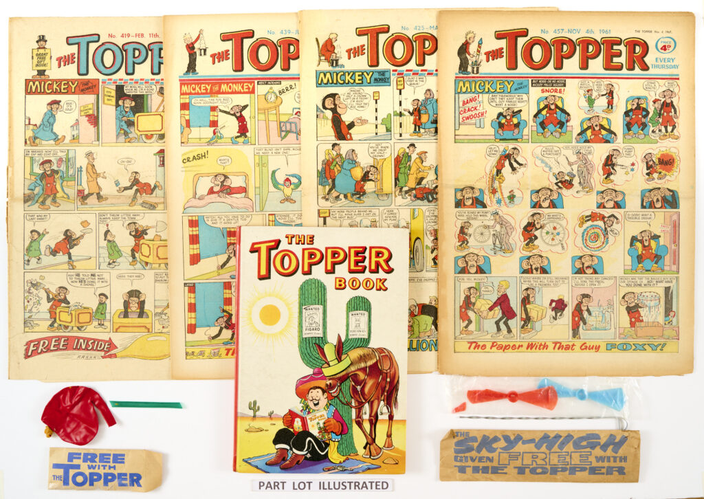 Topper (1961-62) 93 issues between 414-516 With Free Gifts with No 419 The Roaring Romper (balloon perished) and The Sky High Spinner (No 823, 1970). Starring Mickey The Monkey, Beryl the Peril, The White Witch, The Last Warrior, The Adventures of Midshipman Keen by Judge Dredd artist, Ron Smith, Treasure Island and Kidnaped back cover adventures by Dudley Watkins. Lot includes Topper Annuals for 1961 & 1962.