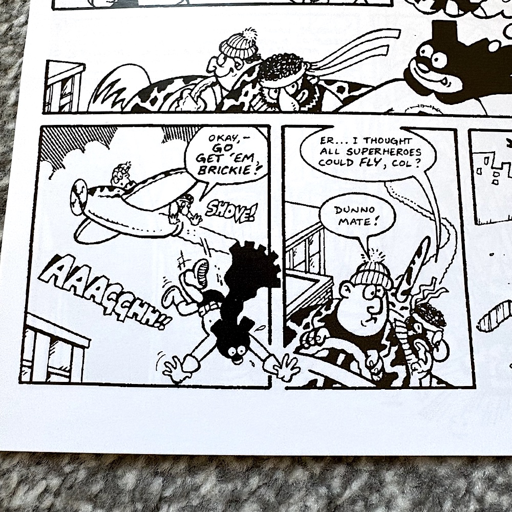 Brickman #2 by Lew Stringer: Brickman is shoved from a plane