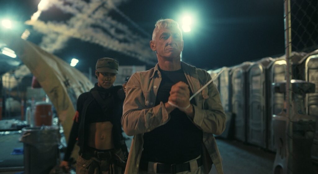 Left to Right: Teyana Taylor as Perfidia and Sean Penn as Col. Steven J. Lockjaw in “One Battle After Another.” A Warner Bros. Pictures Release. Photo: Warner Bros. Pictures