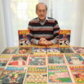 Barrie Tomlinson with just a few of the things he’s edited across his long career. Photo via Barrie Tomlinson