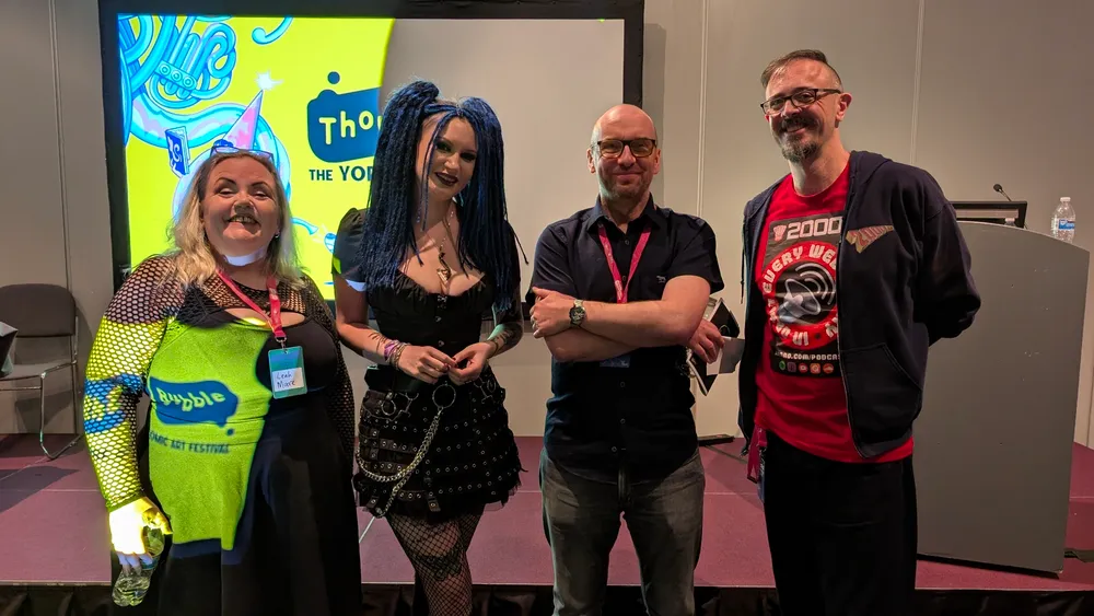 2025 Thought Bubble Talent Search script competition winner Lilith Allen with judges Leah Moore (left) and Rob Williams (second from right) and host Molch-R | Photo: 2000AD