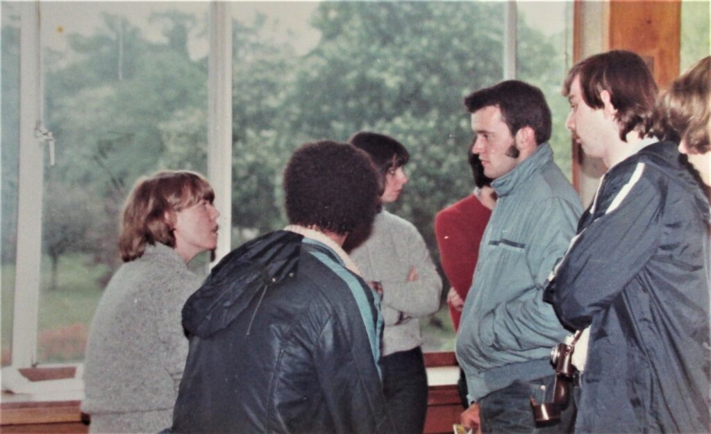 Paul Trimble (in the light blue jacket, meeting Louise Simonson at the Birmingham Comic Art Show in May 1984. Photo via Paul Trimble