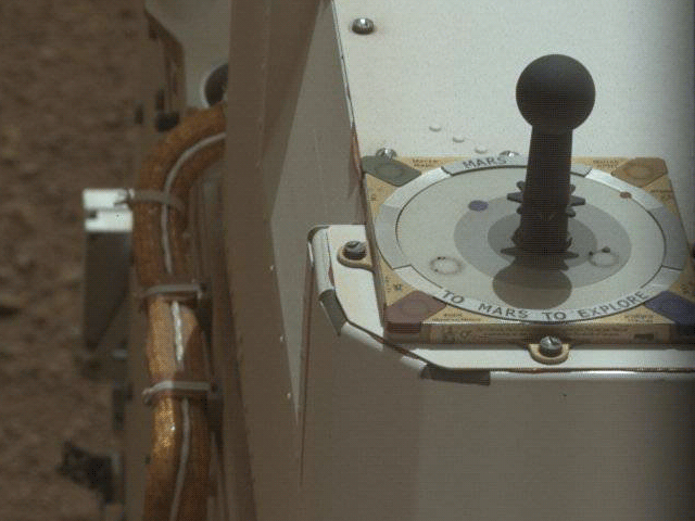 Four Mastcam images of the calibration target -- the Marsdial -- were taken on Curiosity's sol 3 (9th August 2012) over a period of about 8 minutes. In that time, the shadow of the gnomon moved slightly, marking time on Mars with a sundial.Image: NASA / JPL / MSSS / Gordan Ugarkovic