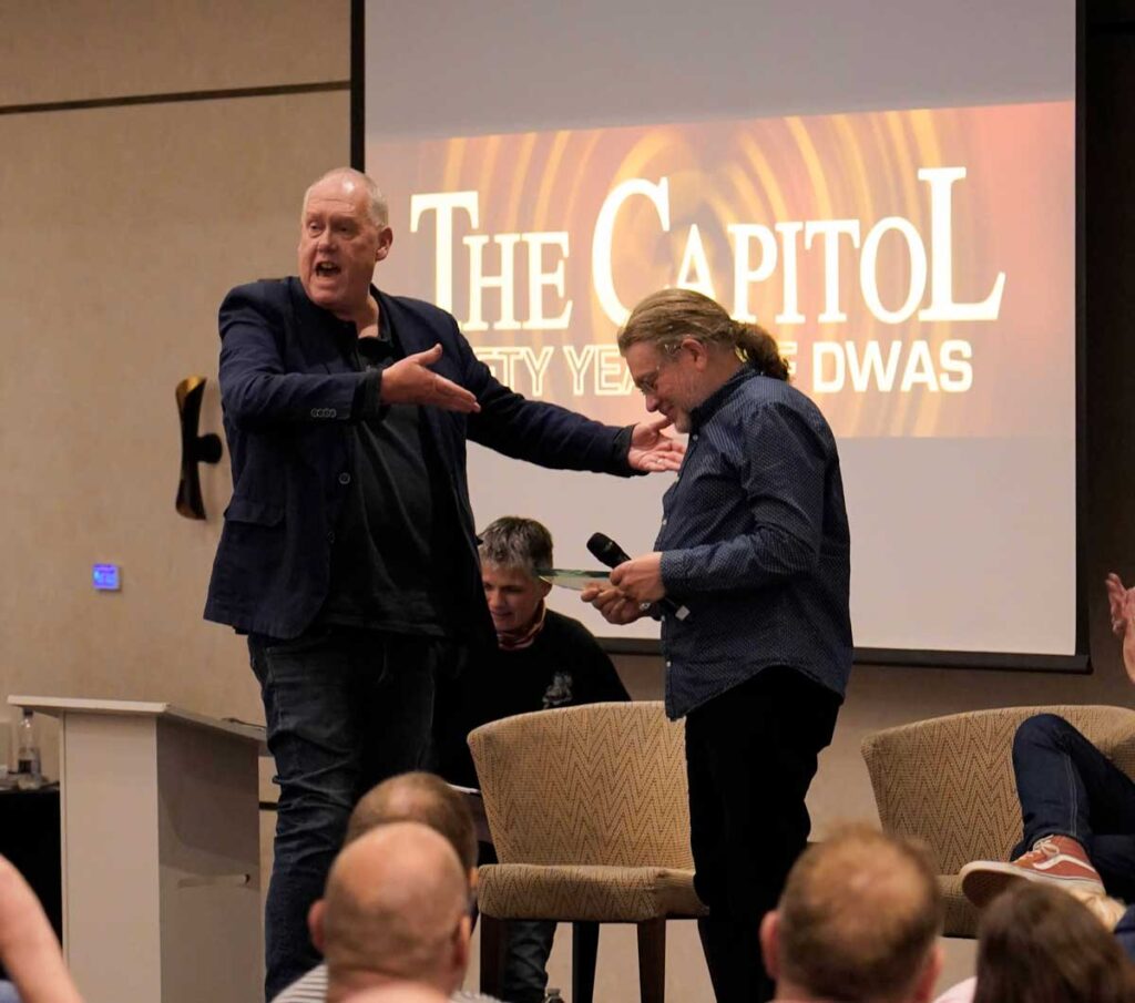 Outgoing Doctor Who Appreciation Society convenor Tony Jordan presents musician Mark Ayres with a Outstanding Contribution to Doctor Who" Award at Capitol 50. Photo: Andy Richards