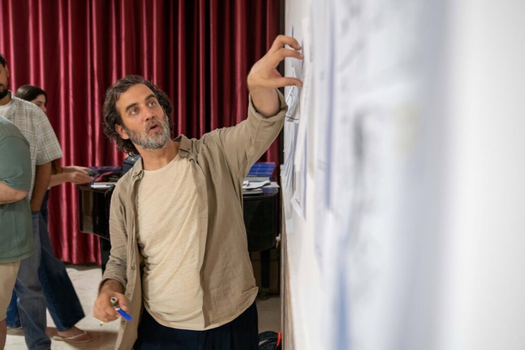 Every day at "Qusasat 2" opened a new door to creativity. The artists and mentor Basel Nasr (pictured) gathered for a session on building the scene and visual storytelling, where they learned how a shot, perspective, and movement can give a story a stronger rhythm and impact. The training also included screenings and discussions of short films, providing a space to explore different storytelling approaches and how to turn them into comics that come to life. Photo: Power Group