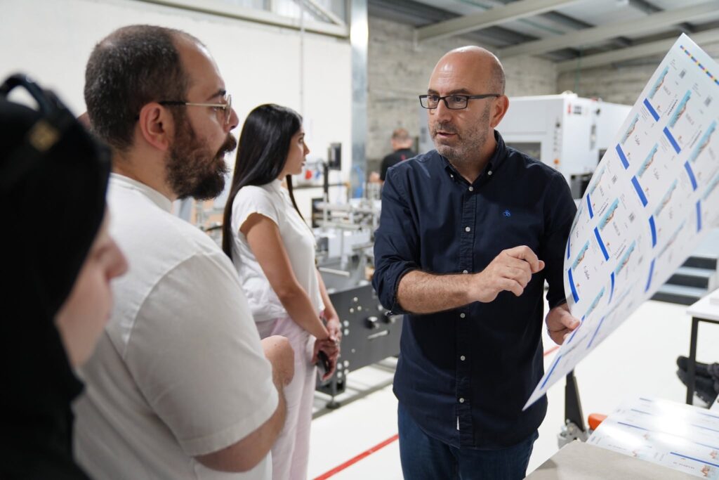 From paper... to print: As part of developing the training program for Qusasat, artists learned about the journey of book production from the inside, through a visit to Noor Printing House in Bethlehem, where David Noor led a masterclass on transforming a digital file into a printed book