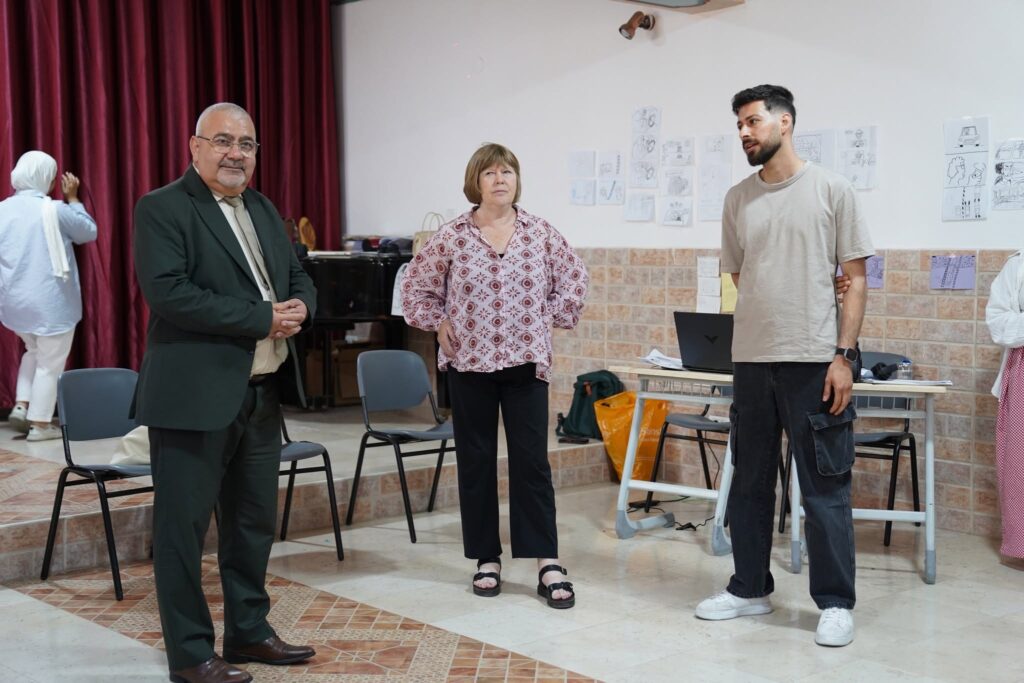 Mr. Vladimir Kharoufeh, Mayor of Beit Jala city, with LICAF’s Director Julie Tait and Power Group co-founder Sliman Mukarker. The Mayor toured Qusasat Comics Camp, met the artists, and got to know the mentors and partners from the UK and Italy. Photo: Power Group