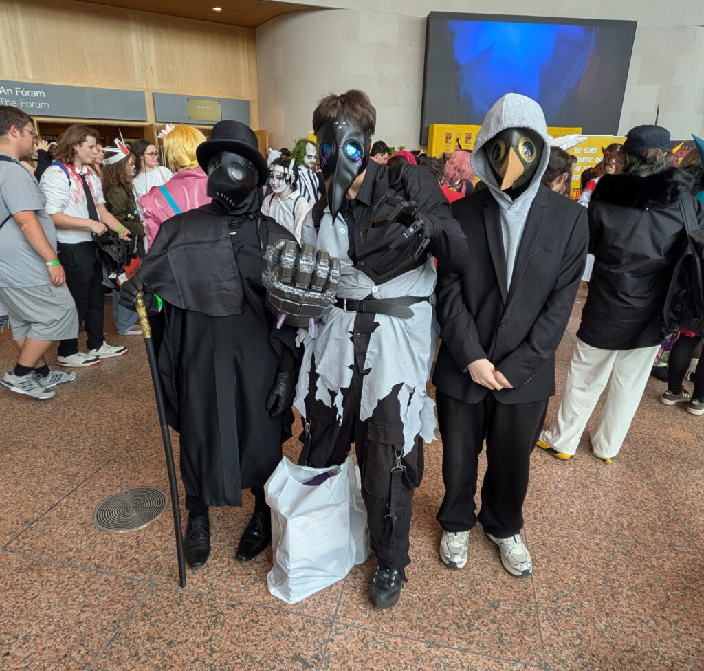 Dublin Comic Con 2026 Cosplay - Lucas and Cain and Ellie as plague doctors | Photo: James Bacon