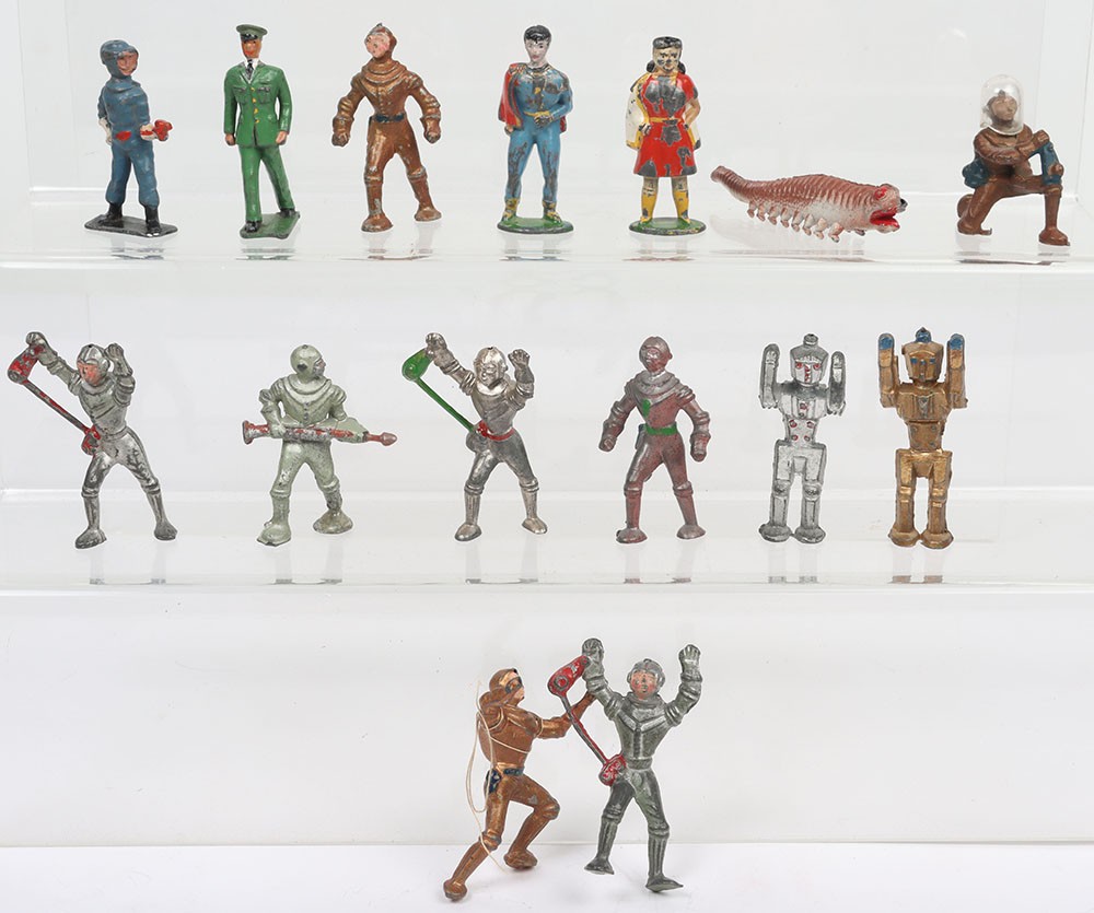 Super Hero and Space lead painted toy figures, Timpo Mary Marvel and Marvel Junior, (both fair condition, some paint loss), JoHillco Spaceman with ray gun, three Spacemen with airlines, (all lack helmets), two Mechanical man in silver and gold, Cherilea Giant Lizard, kneeling, walking and crawling Spacemen, (crawling figure lacks atom gun, and walking figures lack helmets), Crescent Dan Dare and Spaceman with ray gun, (all generally good to fair condition, some paint loss), (15)