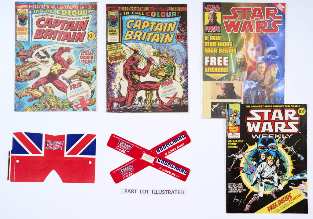 Captain Britain (1976) 1 [fn] wfg Mask, 2 [fn] wfg Boomerang with Star Wars No 1 (1978) [fn-] and Star Wars (Lego) Comic No 1 (1999) [vfn+] wfg 4 stickers (4)