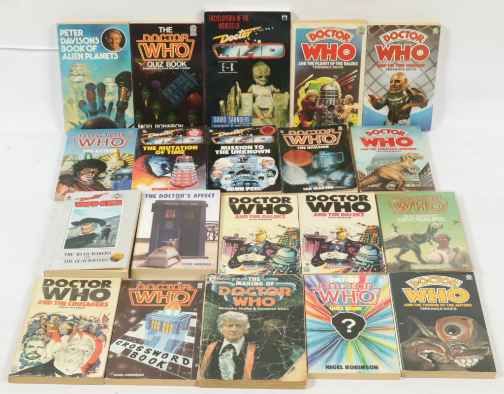 Vectis Auction Lot 15/9/26: Target, a group of twenty Doctor Who paperback books. The lot comprises: • Peter Davison's Book of Alien Planets • The Doctor Who Quiz Book • Encyclopedia of the Worlds of Doctor Who E-K • Doctor Who and the Planet of the Daleks • Doctor Who and the Time Warrior • Doctor Who: The Aztecs • Doctor Who: The Mutation of Time #142 • Doctor Who: Mission to the Unknown #141 • Doctor Who: The Invasion #98 • Doctor Who and the Dinosaur Invasion • Doctor Who: The Myth Makers and The Gunfighters • The Doctor's Affect • Doctor Who and the Daleks • Doctor Who Quiz Book of Dinosaurs • Doctor Who and the Crusaders • plus others Condition appears Fair to Good.