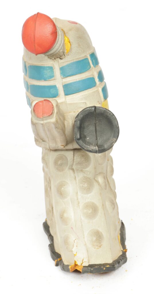 Newfield Ltd. Doctor Who vintage Bendy Dalek, 1965 – a rare bendable foam rubber figure finished in off-white with turquoise and yellow midsection bands and red detailing. It is in deteriorating condition. Condition appears Fair to Good.
