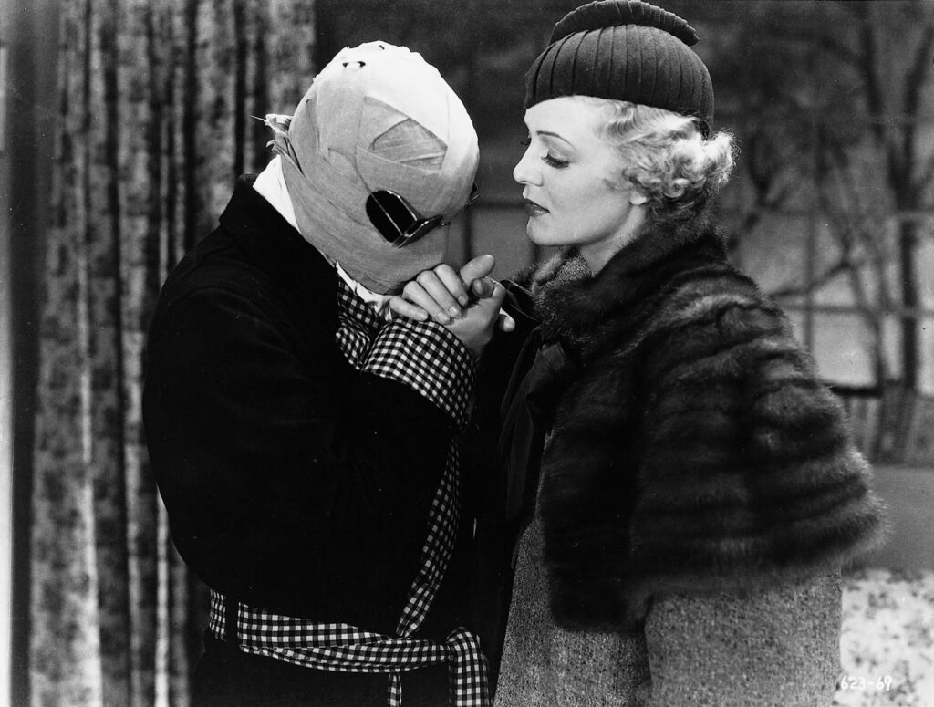 Claude Rains as Dr. Jack Griffin and Gloria Stuart as Flora Cranley in The Invisible Man