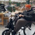 Al Davison testing out an enhancement to his wheelchair… can you help him secure it?