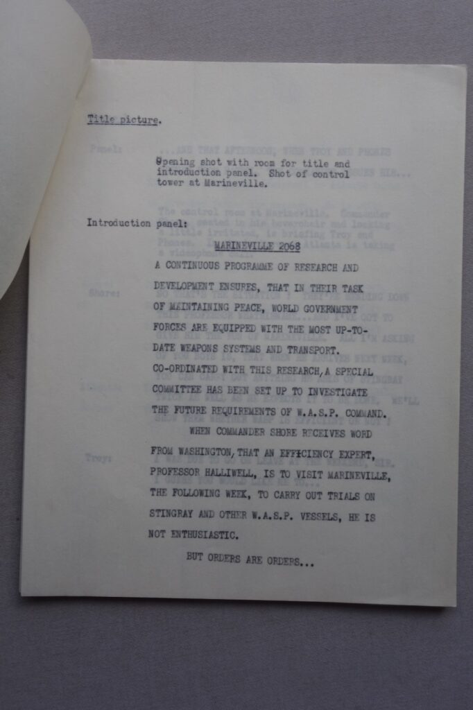 This rarely seen item came from the estate of David Slinn, who passed away late last year. Phil-Comics sold a similar item to this a few months ago, which had come into stock in January, and had been informed by the vendor that there were no more items. Last month he found a further ten or so different items from the same collection, which is the last of what he had, so to the best of our knowledge this is the last one that we will have access to. The front cover says "Stingray 'The Visiting Professor' (complete script)" but there is a small piece of paper (1 x 1/4 inch) under the staples which shows there was an additional cover page, now missing. There's one intro type page next and then it goes into 39 pages to the end, each titled Frame 1, Frame 2, Frame 3 and so on to Frame 39. The final text of Frame 39 (the last page of this script) says "Good to be back at Marineville. Now for some peace and quiet, I've had enough of visiting experts to last me a lifetime." This could be construed as a final line, so perhaps this is the complete script, but the other script sold went to Frame 43, which suggests this has at least five pages missing at the back. Lovely item nonetheless, and rare as hen's teeth!