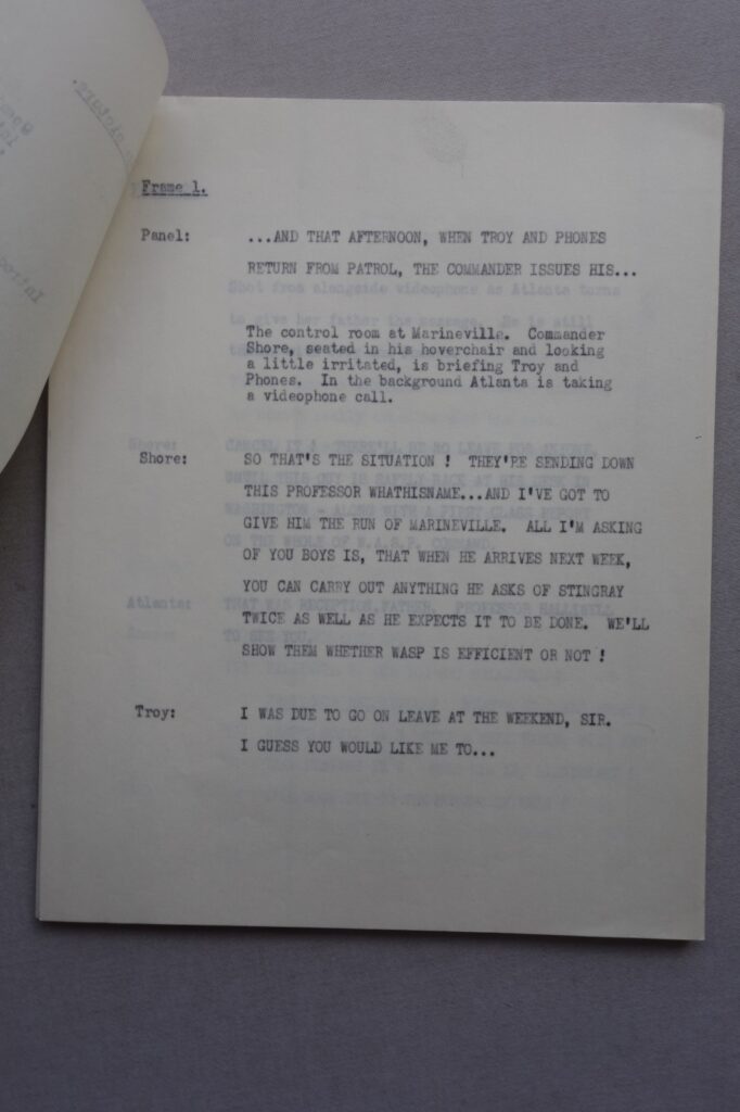 This rarely seen item came from the estate of David Slinn, who passed away late last year. Phil-Comics sold a similar item to this a few months ago, which had come into stock in January, and had been informed by the vendor that there were no more items. Last month he found a further ten or so different items from the same collection, which is the last of what he had, so to the best of our knowledge this is the last one that we will have access to. The front cover says "Stingray 'The Visiting Professor' (complete script)" but there is a small piece of paper (1 x 1/4 inch) under the staples which shows there was an additional cover page, now missing. There's one intro type page next and then it goes into 39 pages to the end, each titled Frame 1, Frame 2, Frame 3 and so on to Frame 39. The final text of Frame 39 (the last page of this script) says "Good to be back at Marineville. Now for some peace and quiet, I've had enough of visiting experts to last me a lifetime." This could be construed as a final line, so perhaps this is the complete script, but the other script sold went to Frame 43, which suggests this has at least five pages missing at the back. Lovely item nonetheless, and rare as hen's teeth!